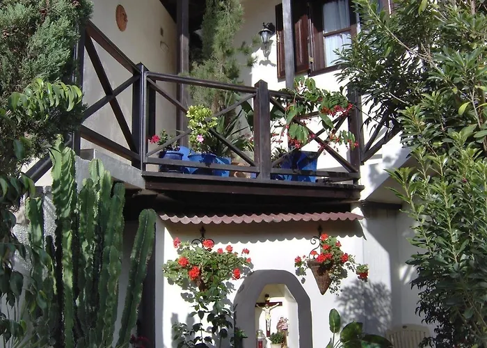 Апартаменты Aptos Monasterio De San Antonio 6